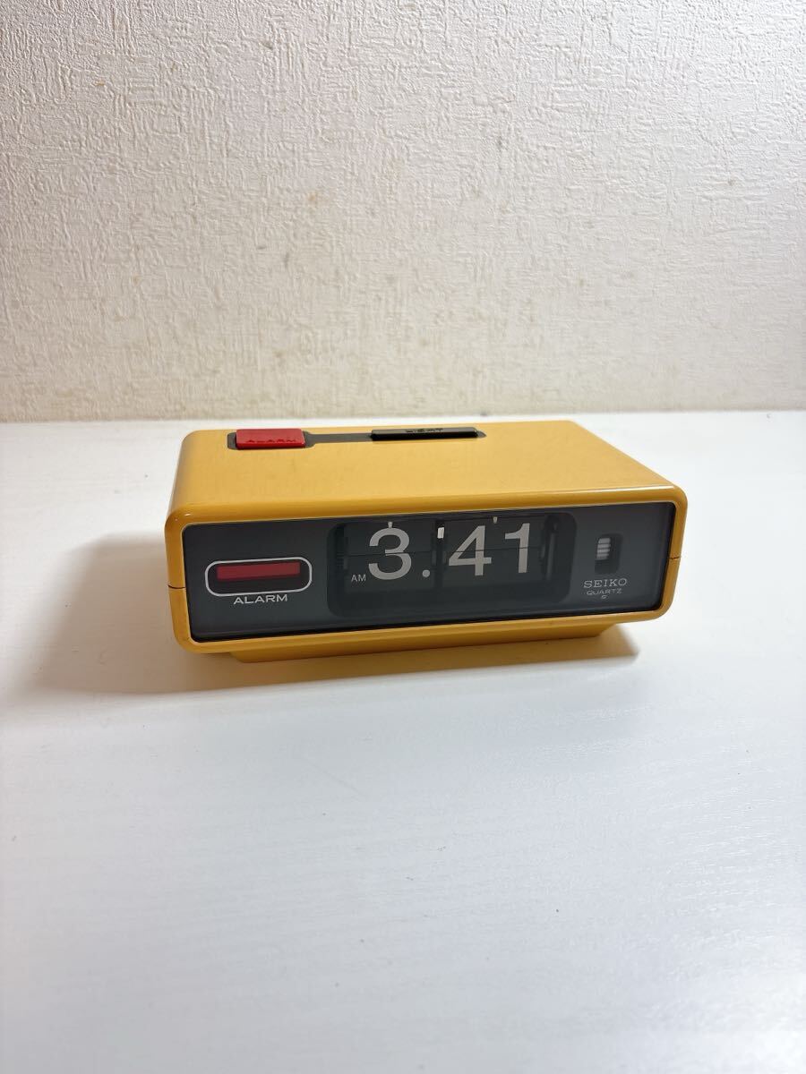 2749 SEIKO セイコー QN870B パタパタ時計 置時計 アラーム 目覚まし時計 イエロー 昭和レトロ 当時物 未チェックジャンク