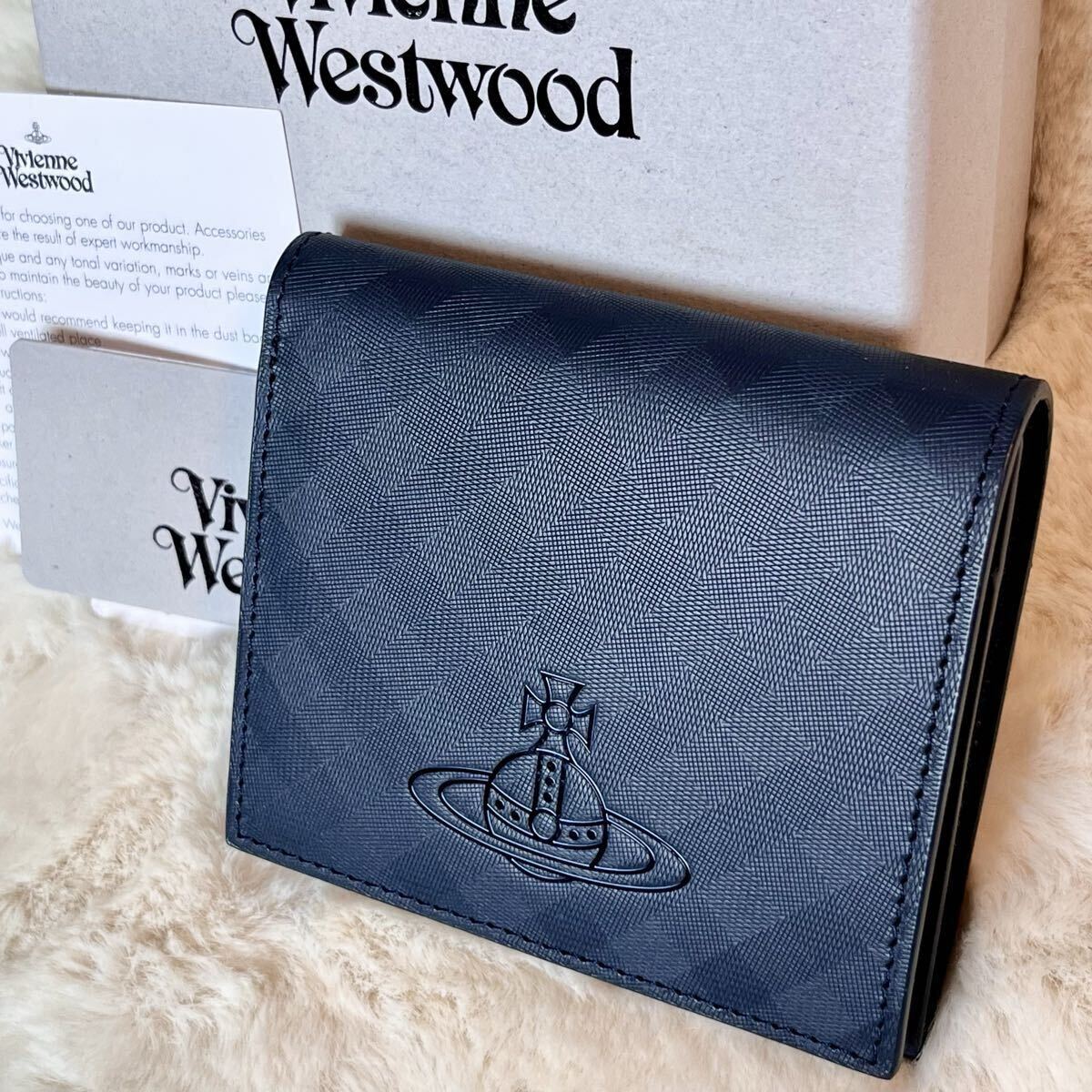 新品 Vivienne Westwood スムースレザースリム二つ折り財布 紺 ネイビー ヴィヴィアンウエストウッド オーブORB ショッパー付き
