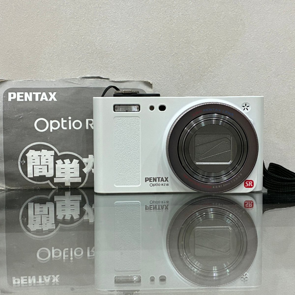 【242_19561】PENTAX ペンタックス Optio RZ18 デジカメ ホワイト 動作未確認 付属品バッテリー(バッテリーチャージャー等なし）・取説のみ