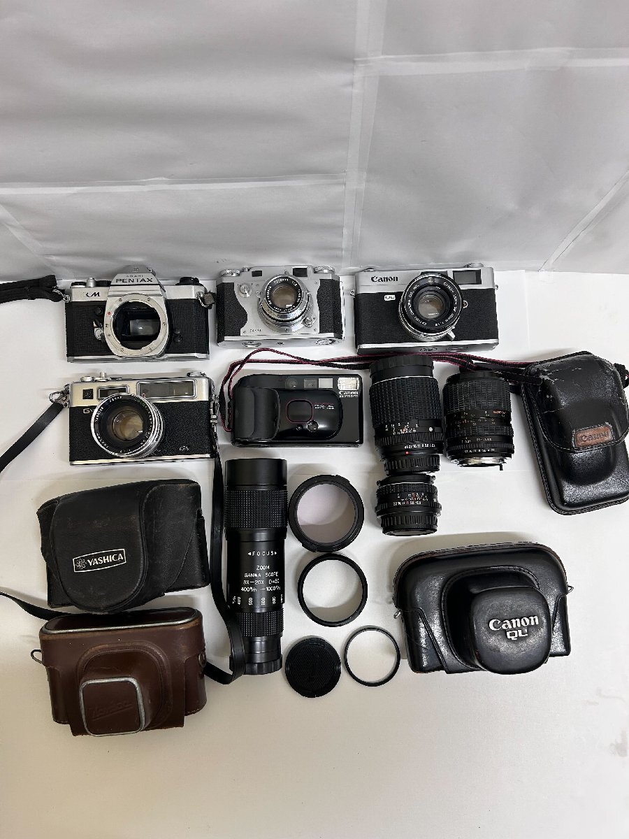【581_82741】フィルムカメラ・レンズおまとめ/9点/Canon PENTAX YASHICA SIGMA SANWAなど/稼働未確認品/専用ケース有/現状品/その他備品有