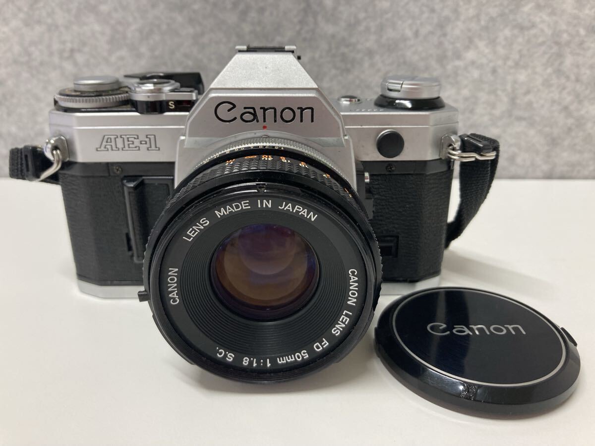 2933) Canon キャノン AE-1 フィルムカメラ CANON LENS FD 50mm 1:1.8 レンズ 動作未確認 現状品