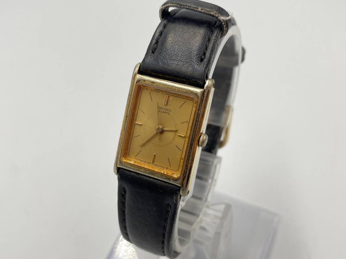 SEIKO セイコー 1221-5590 クォーツ 3針 スクエアフェイス アナログ ゴールド系 黒系ベルト ヴィンテージ 腕時計 テスター反応〇 A2092