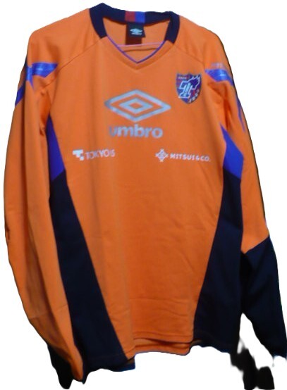 レア物?　UMBRO【アンブロ:(株)デサント】製2015～20FC東京スポンサーロゴ入り長袖練習着(プラクティスシャツ・スウェット?)O-XO　オレンジ