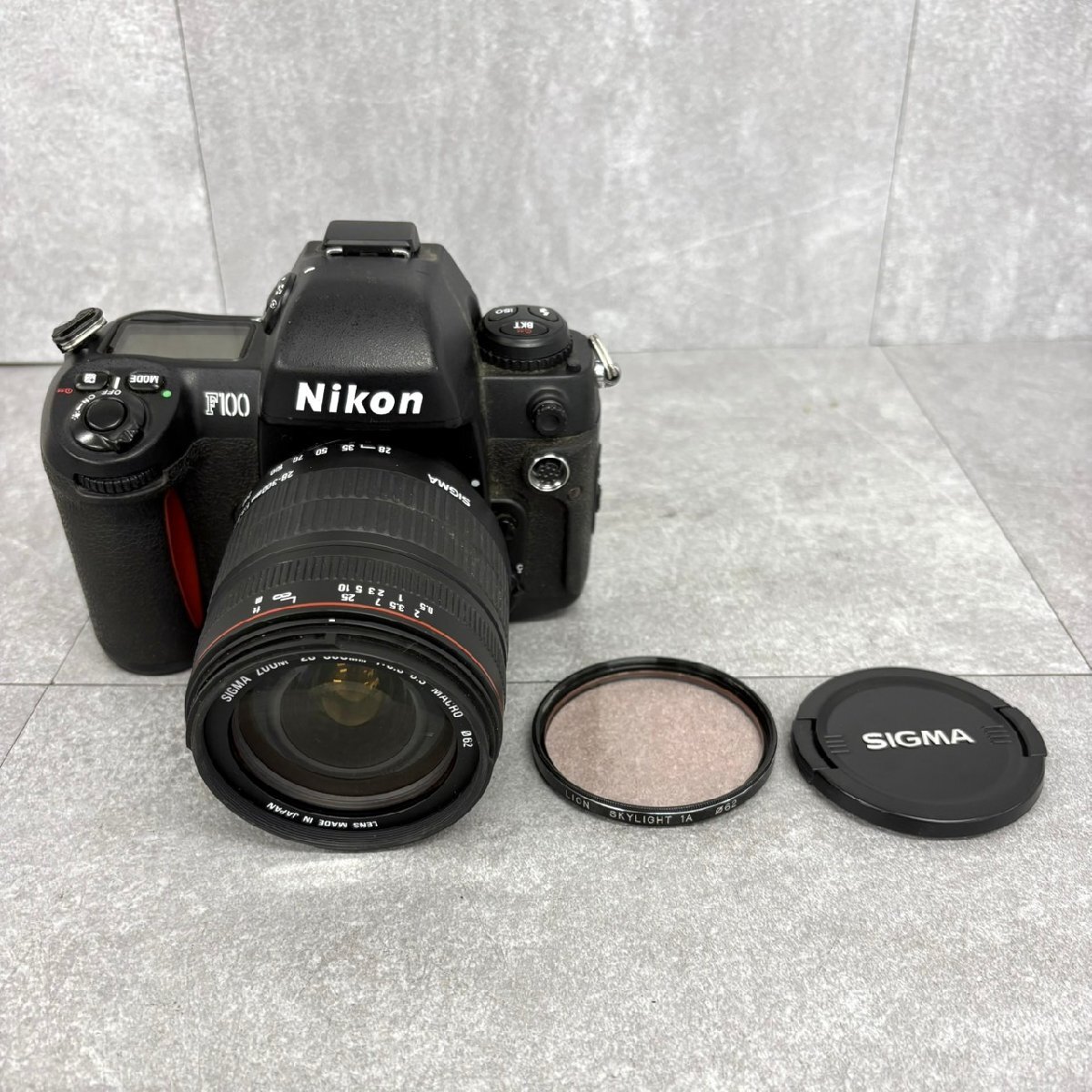 NK5193 Nikon ニコン F100 一眼レフフィルムカメラ SIGMA 28-300㎜ 1:3.5-6.3 D LION SKYLIGHT 1A 現状渡し 中古 ジャンク品