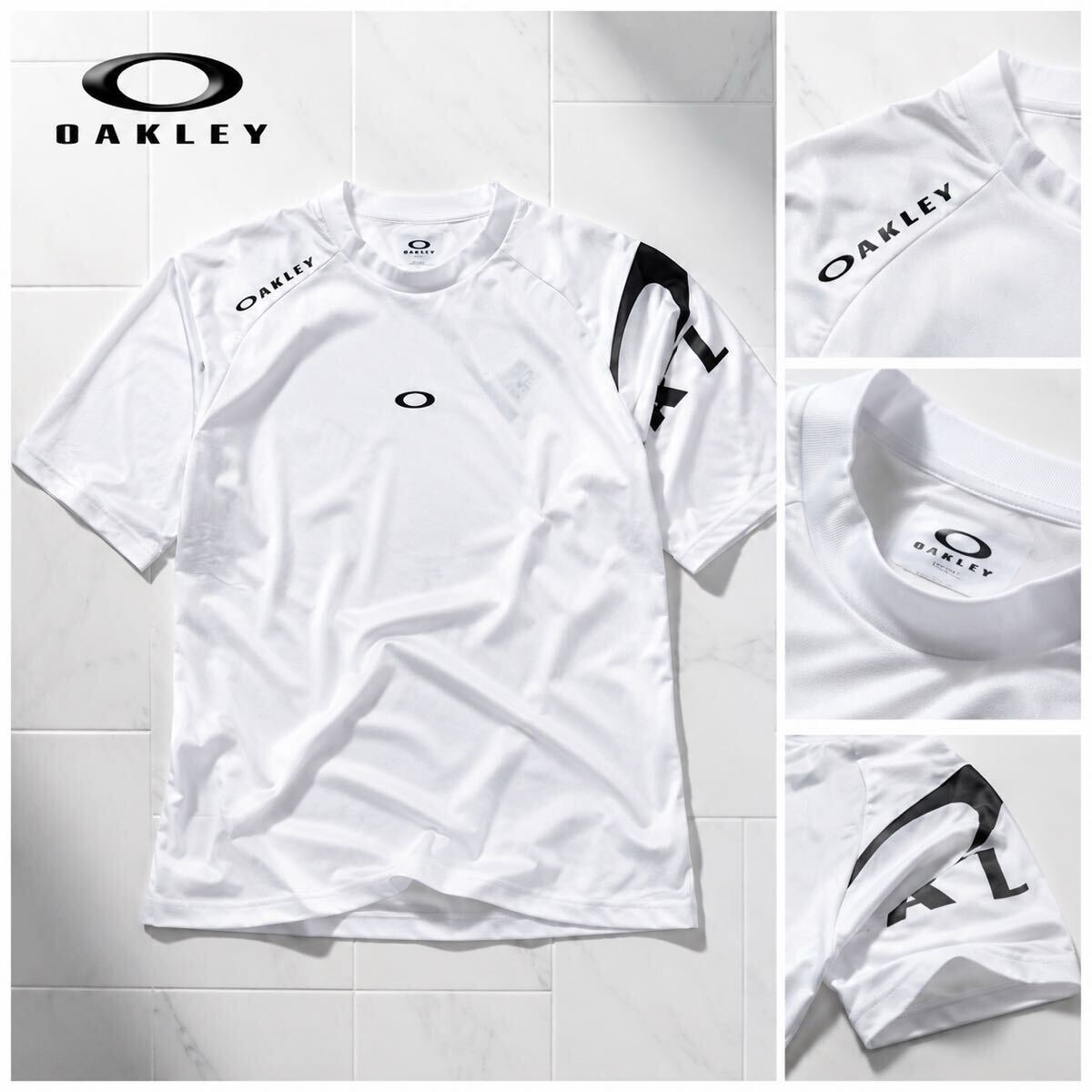 ▼E531新品 【JPNメンズXL】白　オークリー ゴルフに最適 新素材OAKLEY SYNC PACK高機能 左腕BIGロゴ 半袖クルーネックシャツ