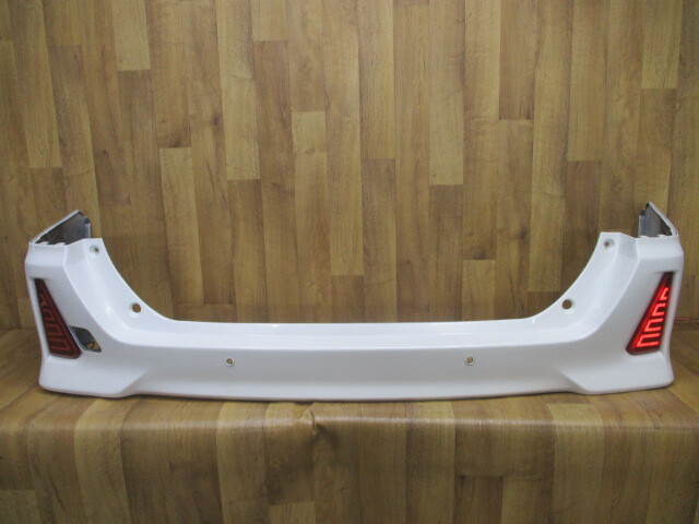 F11/ ZRR80W/ZRR85Wヴォクシー/ノア純正リアバンパー LEDリフレクターランプ付52159-28630