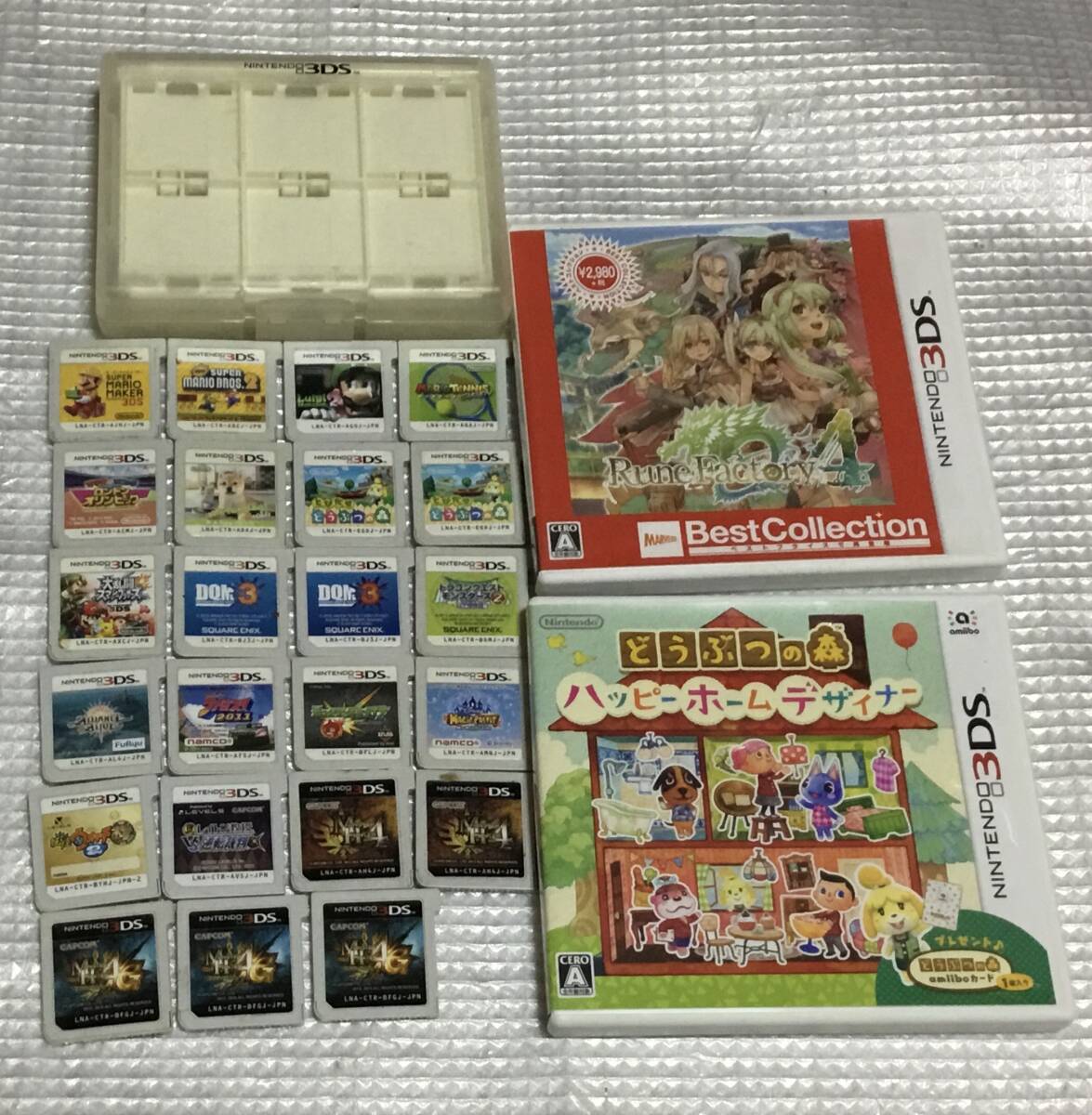 k0604:ニンテンドー3DS用ソフト　25本　一部箱付き　収納ケース付き　※ジャンク