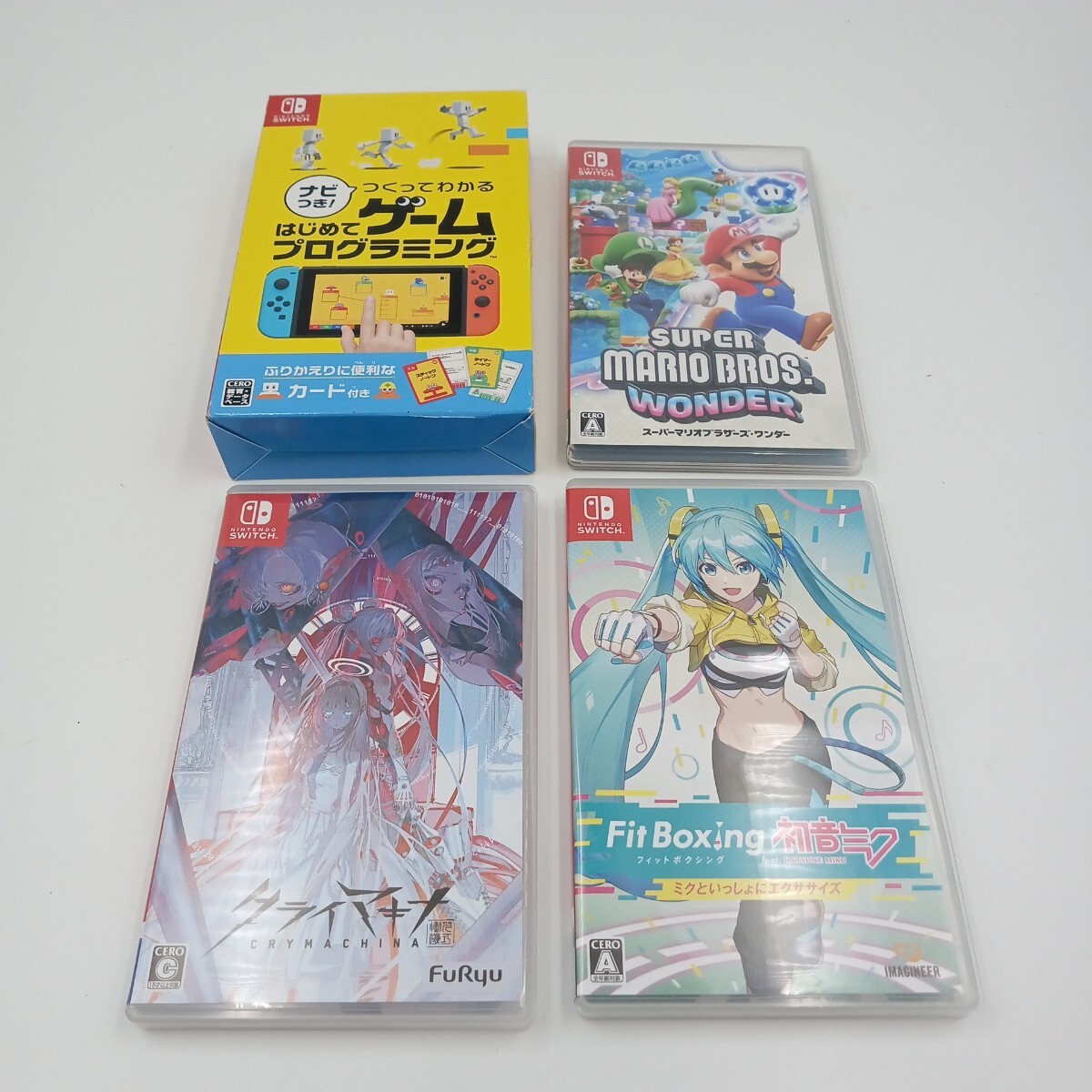 F Nintendo Switch ニンテンドースイッチ ソフト 4点まとめ はじめてゲームプログラミング マリオブラザーズワンダー フィットボクシング等