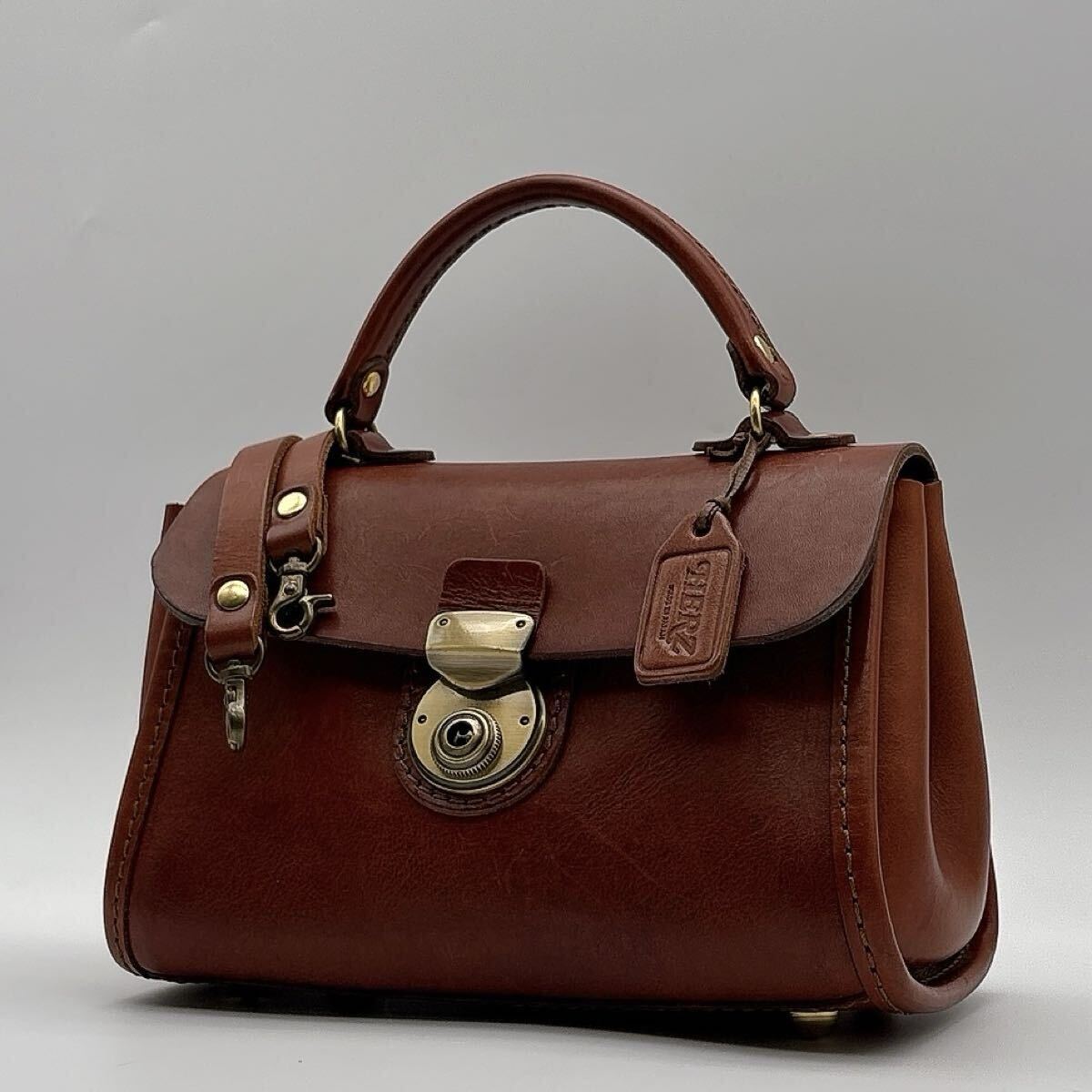 y269 美品 HERZ ヘルツ Petit Mignon プチミニョン 2way ハンドバッグ ショルダーバッグ 斜めがけ オールレザー ゴールド金具 ブラウン
