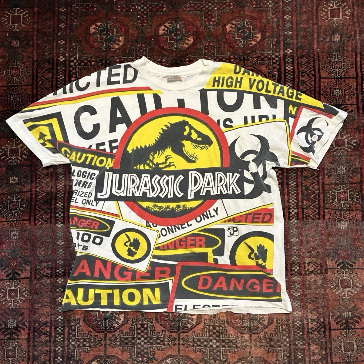 90s USA製 JURASSIC PARK ジュラシックパーク 総柄 オールオーバープリント Hanes XL 映画T ムービーT シングルステッチ ホワイト 古着