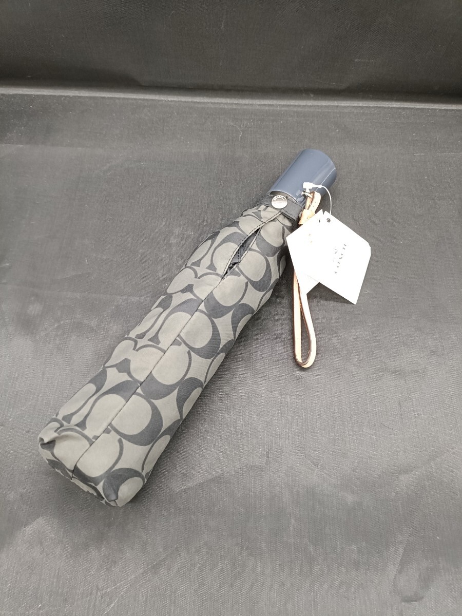 ★未使用★ COACH コーチ F63364 折り畳み傘 ワンタッチ シグネチャー柄 ブラック系 雨具 折りたたみ アンブレラ