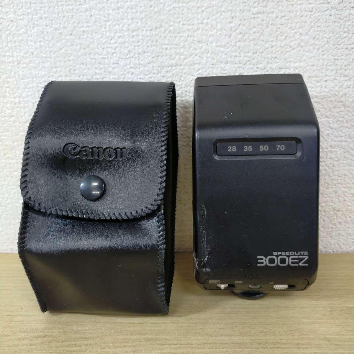 稲yA4749 Canon SPEEDLITE 300EZ カメラ用 スピードライト フラッシュ 電池室液漏れ跡あり ケース付き 現状渡し