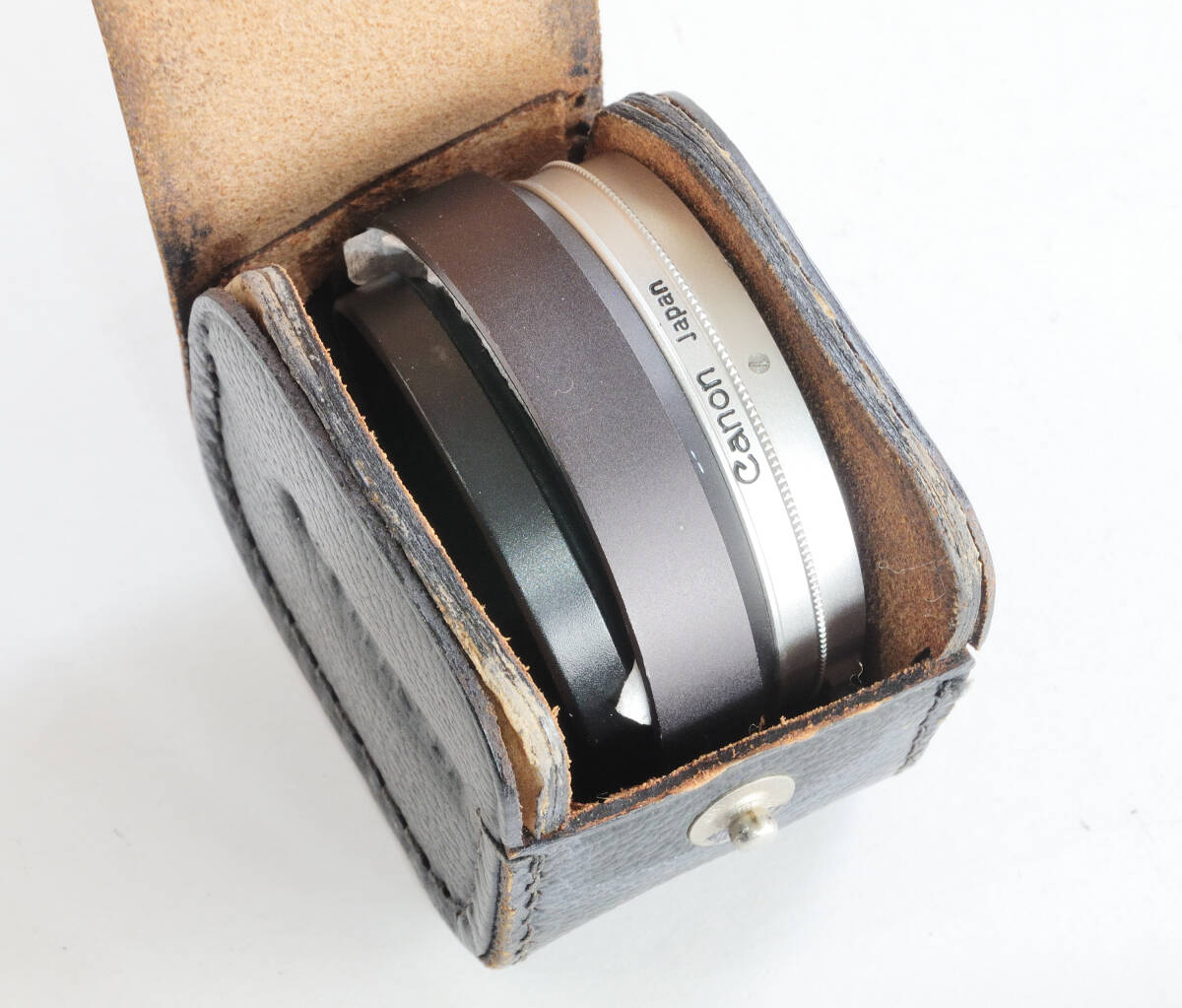 キャノン Canon レンズフード S-50・金属キャップ・48mmフィルター・革製ケース（中古品）4点セット