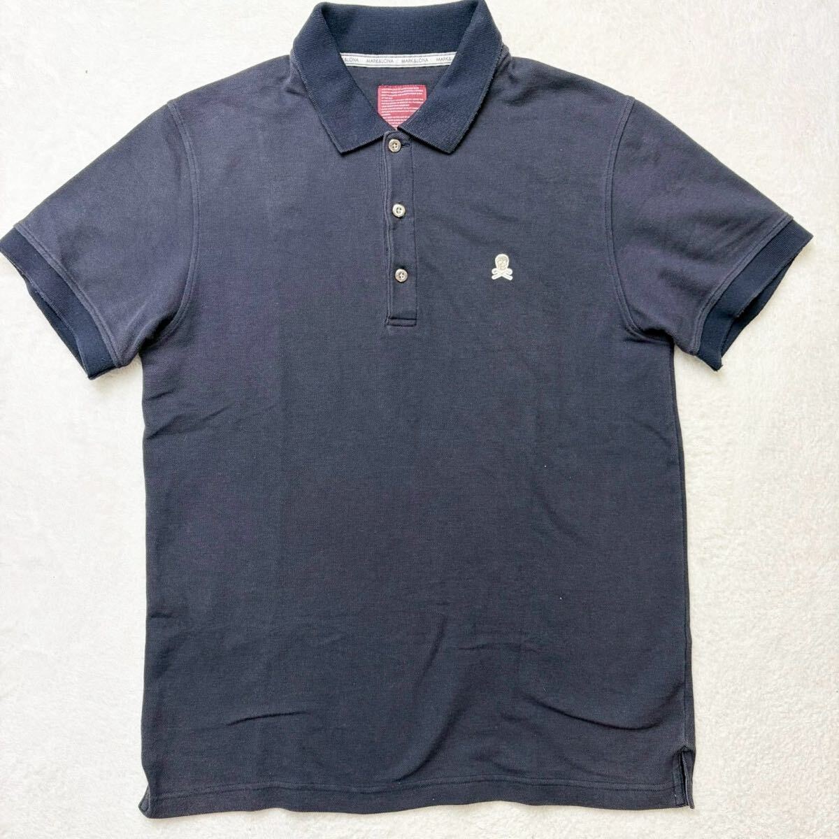3561希少Lサイズ◎MARK&LONA マークアンドロナ ポロシャツ 半袖 スカルロゴ ストレッチ 吸収速乾 ブランドロゴ GOLF ゴルフウェア ネイビー