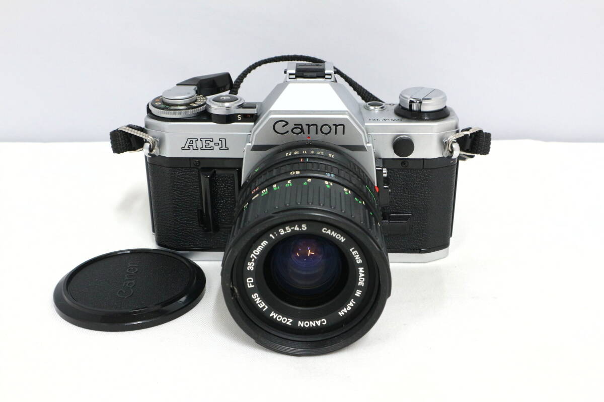 【動作確認済】Canon キャノン AE-1 シルバー フィルムカメラ + FD 35-70mm F3.5-4.5 ズームレンズ 現状品 Y477