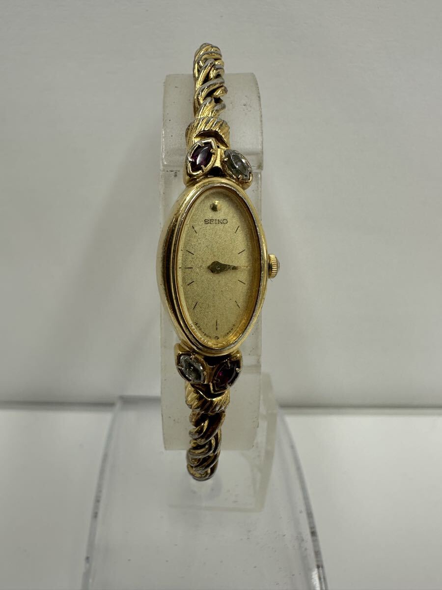 【S3401-i】 腕時計 SEIKO 1E20-5760 不動品 セイコー クォーツ ゴールド カラーストーン