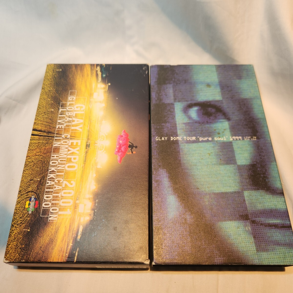 193 GLAY VHS 2本セット EXPO 2001 GLOBAL COMMUNICATION IN HOKKAIDO / DOME TOUR pure soul 1999 ライブ ビデオテープ