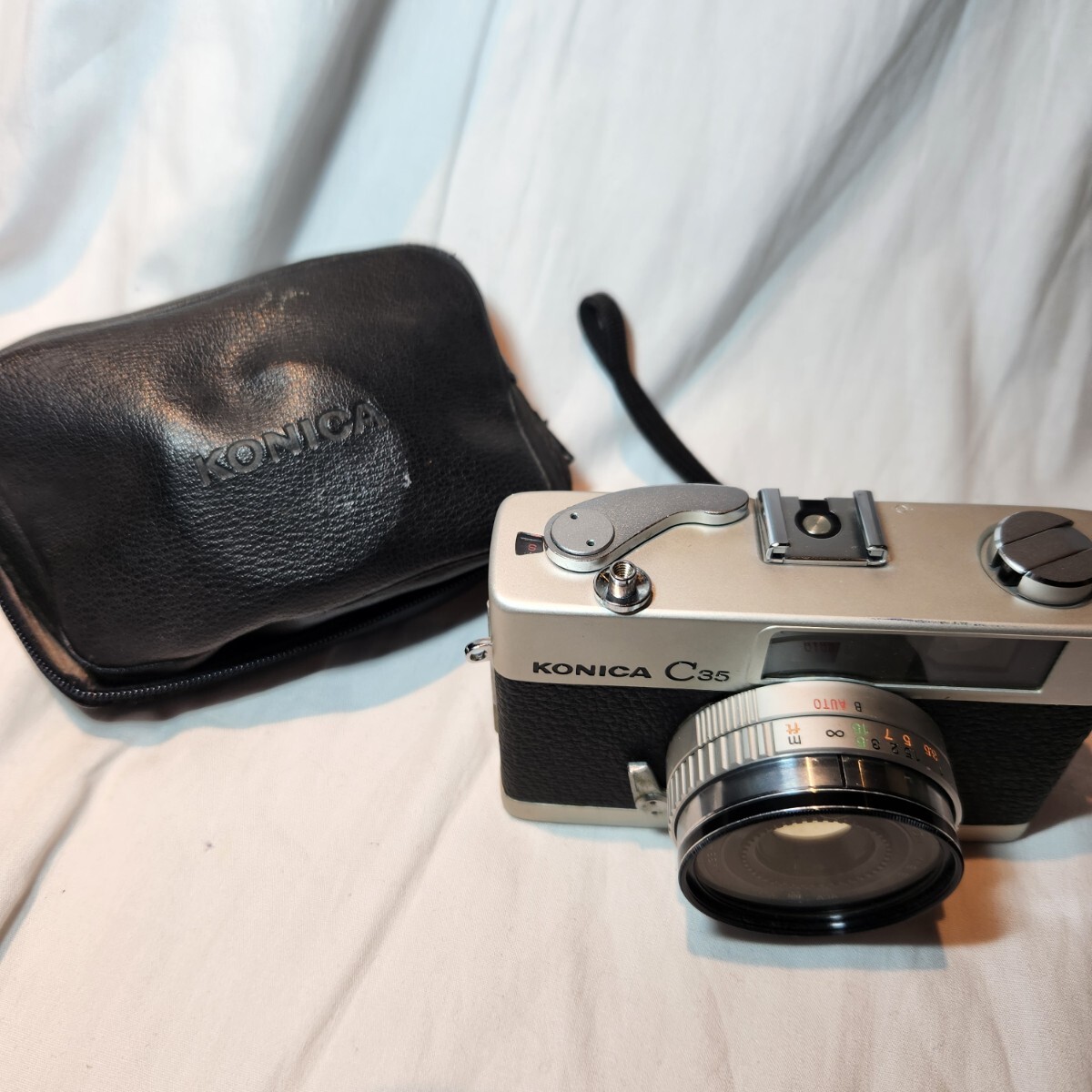 446【商品名】KONICA C35 初代 1968年 コニカ コンパクトフィルムカメラ ケース付 動作未確認