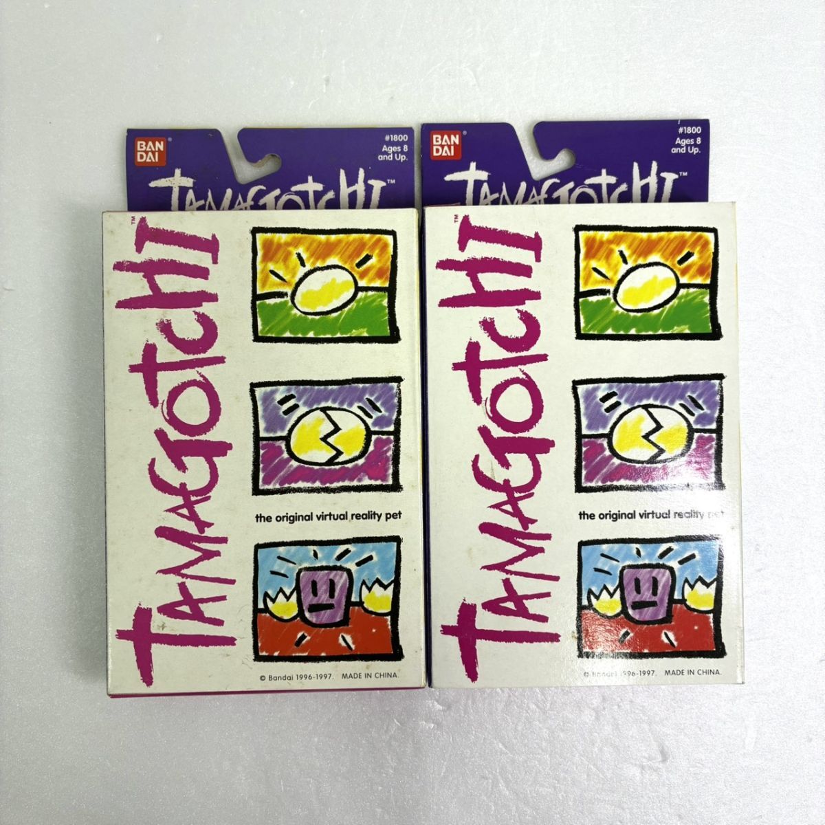 S018-W24-337 ◎ 【未開封】バンダイ TAMAGOTCHI たまごっち #1800 2点セットまとめ売り 育成ゲーム おもちゃ 電子玩具 DA