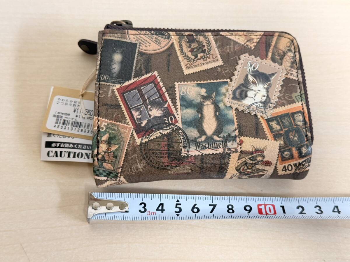 【新品タグ付】　わちふぃーるど 猫のダヤン やわらか切手 2つ折り財布 本革 レザー 総柄 定価11550円 WACHIFIELD コンパクトウォレット