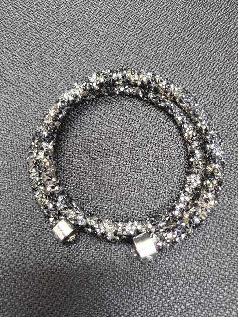 $T115355:SWAROVSKI スワロフスキー スターダスト ブレスレット アクセサリー レディース ブラック系×シルバー系 中古
