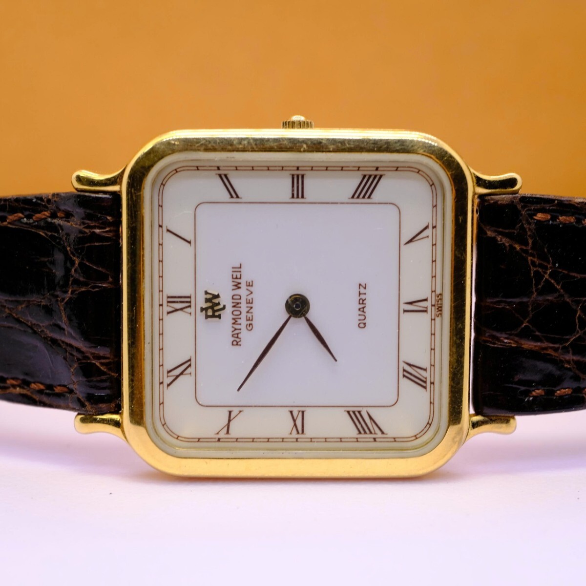 【C328】レイモンドウェイル RAYMOND WEIL GENEVE 18K G.P 5749 ローマン文字盤 クォーツ メンズ 腕時計 稼働品 純正・純正尾錠