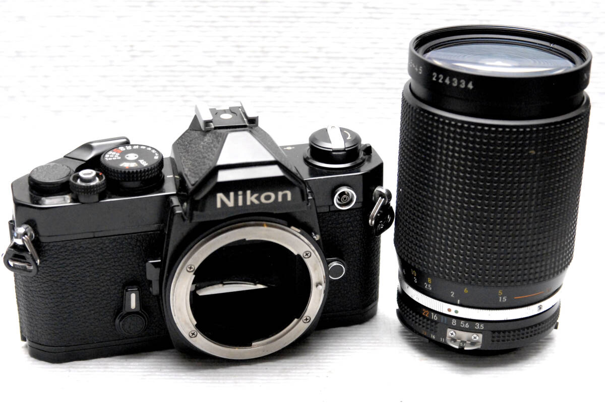 Nikon ニコン製 昔の高級一眼レフカメラ FM（黒）ボディ +（純正35-135mm高級レンズ付）希少品