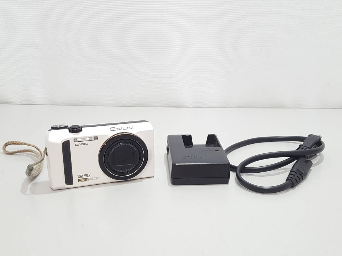 【作動不明 ジャンク品】CASIO カシオ EXILIM エクシリム EX-ZR100 コンパクトデジタルカメラ/デジカメ/光学12.5倍ズーム/06KO080905