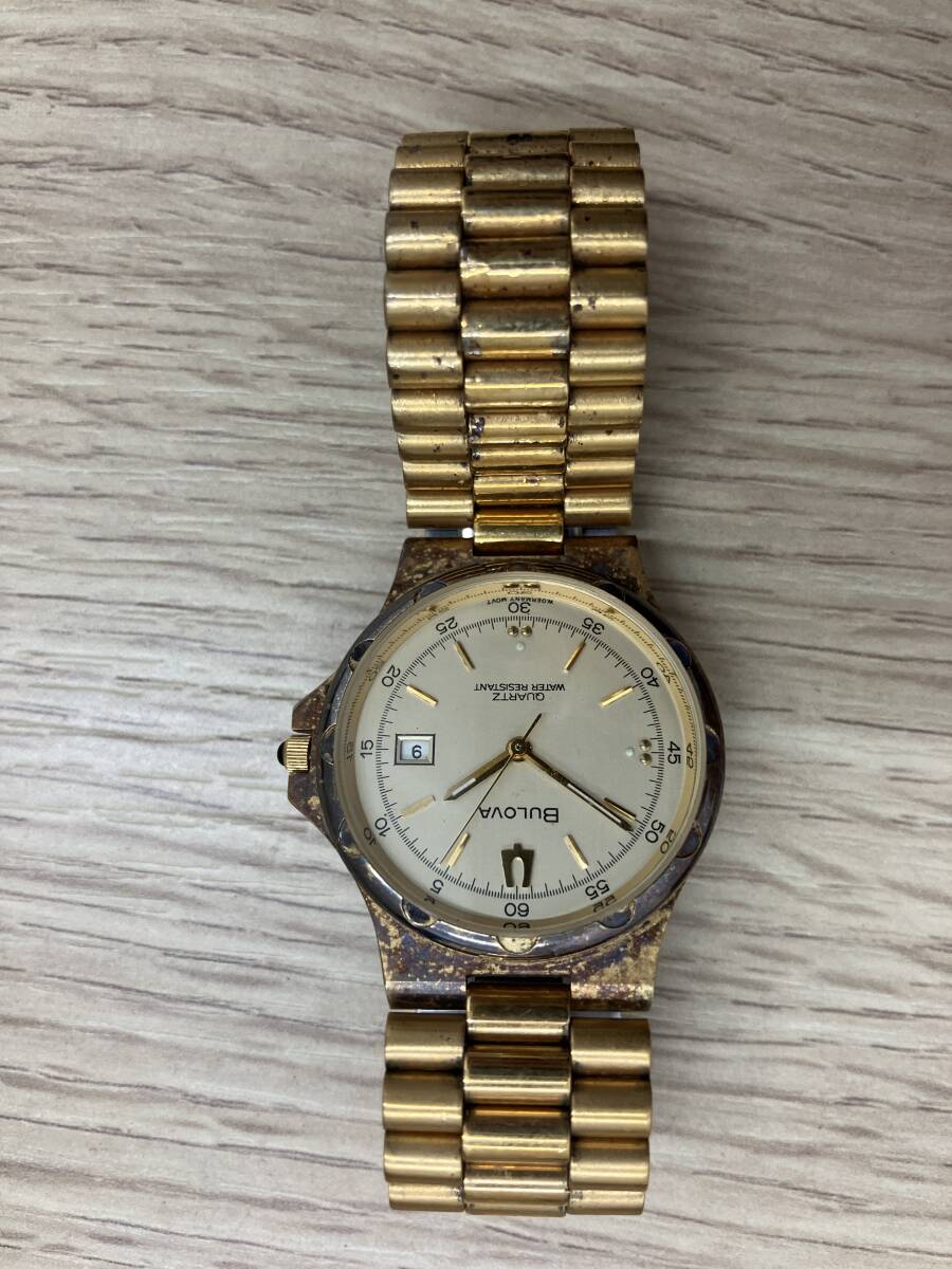 BULOVA ブローバ 9063-5020 クォーツ 三針 ラウンド デイト ゴールド系 ヴィンテージ 腕時計【824606】