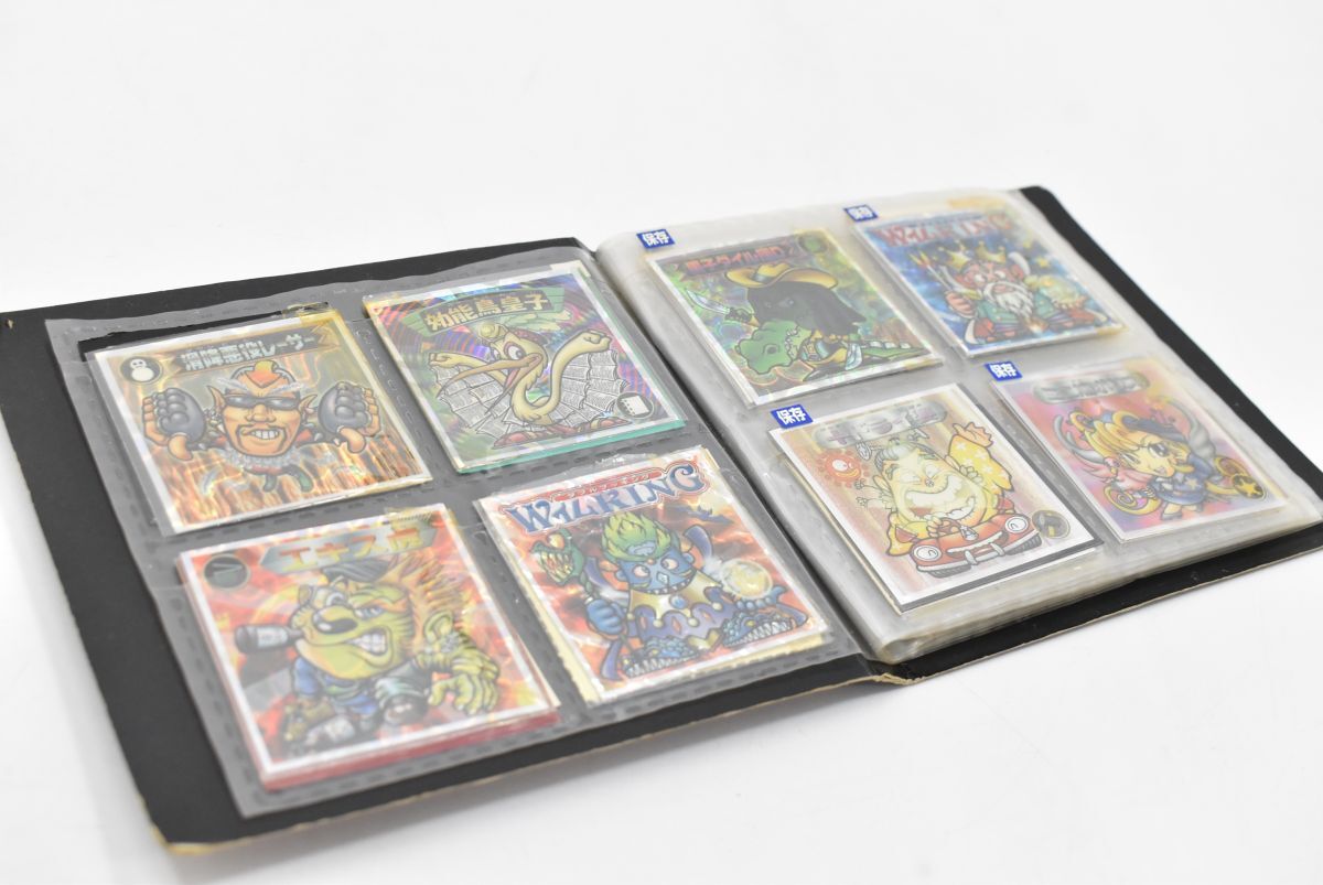(6006S 01812M13) 1円～ ビックリマン 遊戯王 シール 70枚以上 ロッテ 森永 スーパーゼウス 2000 他 専用ファイル付 いろいろ まとめて