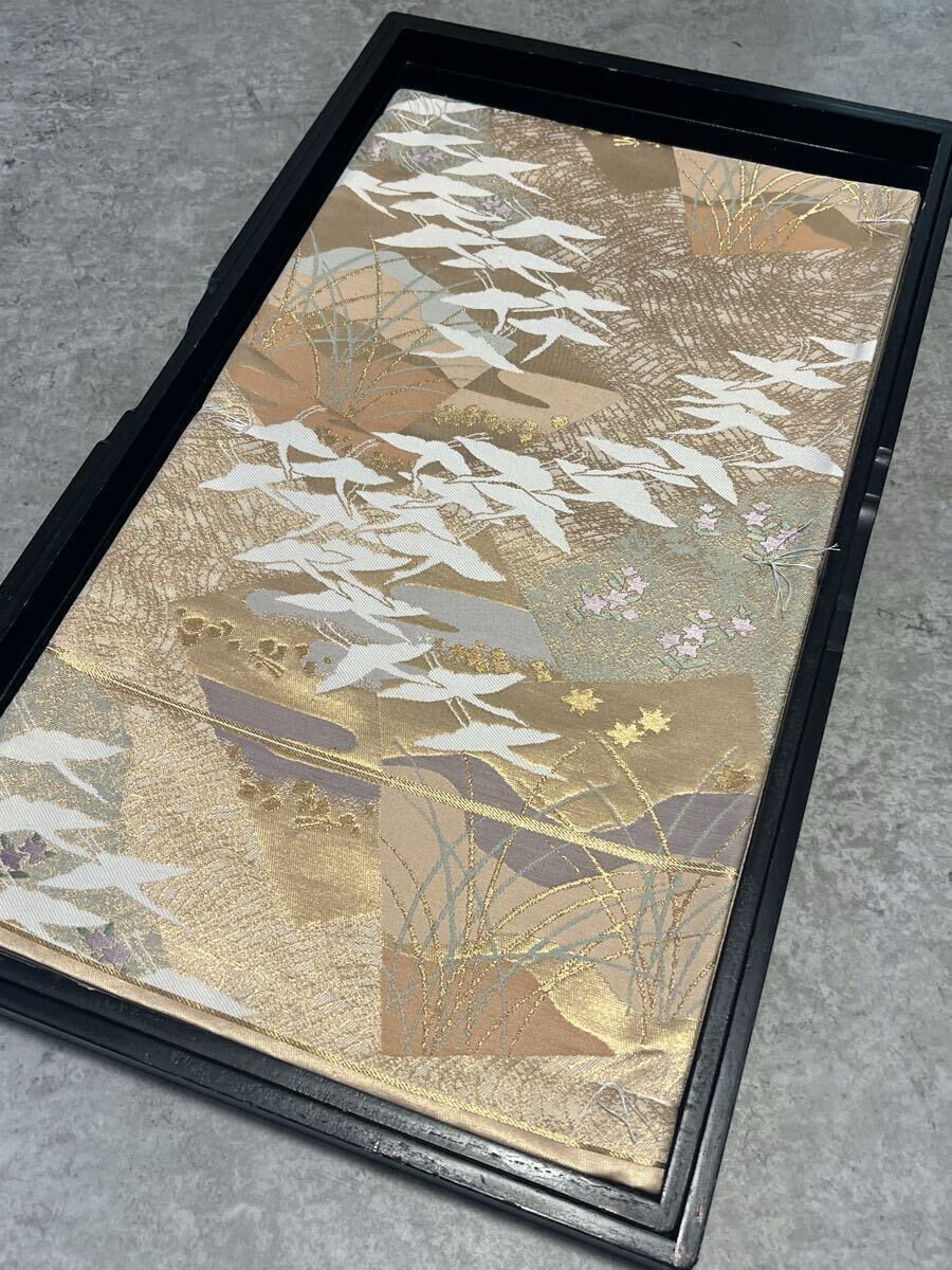 帯 未使用 袋帯 しつけ糸付き 金糸 鶴花 ゴールド系 織物