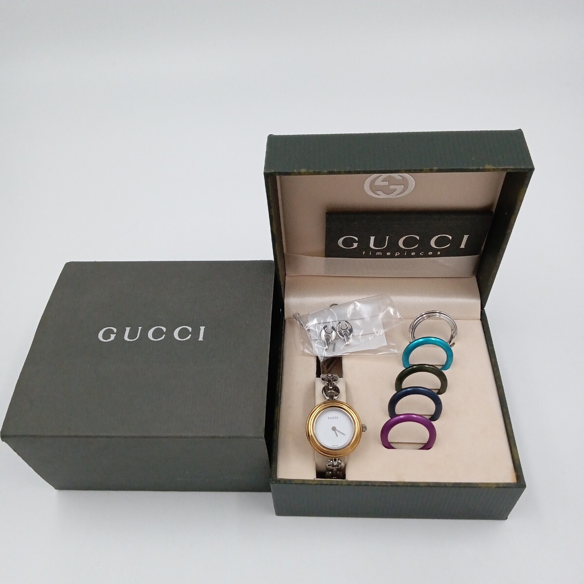 F GUCCI グッチ 腕時計 バングルウォッチ チェンジベゼル11/12.2L ホワイト文字盤 シルバー 箱付 1911344 電池新品交換済み