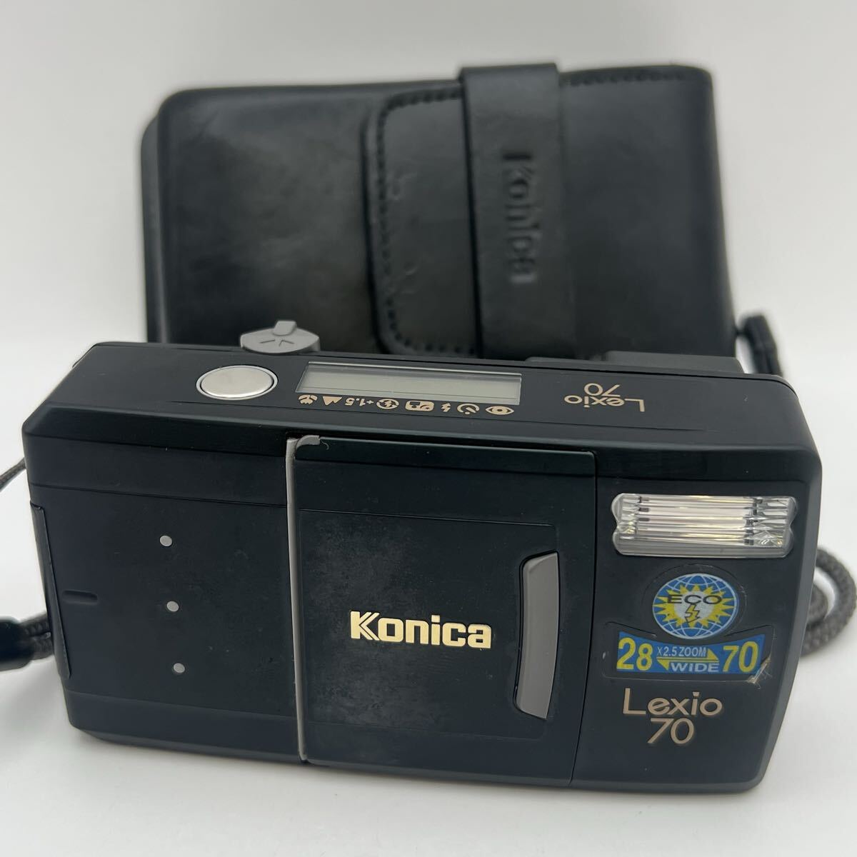 δ Konica Lexio 70 28-70mm コンパクトフィルムカメラ ケース付 ブラック 動作未確認 現状品 同梱可能【宅急便コンパクト発送】