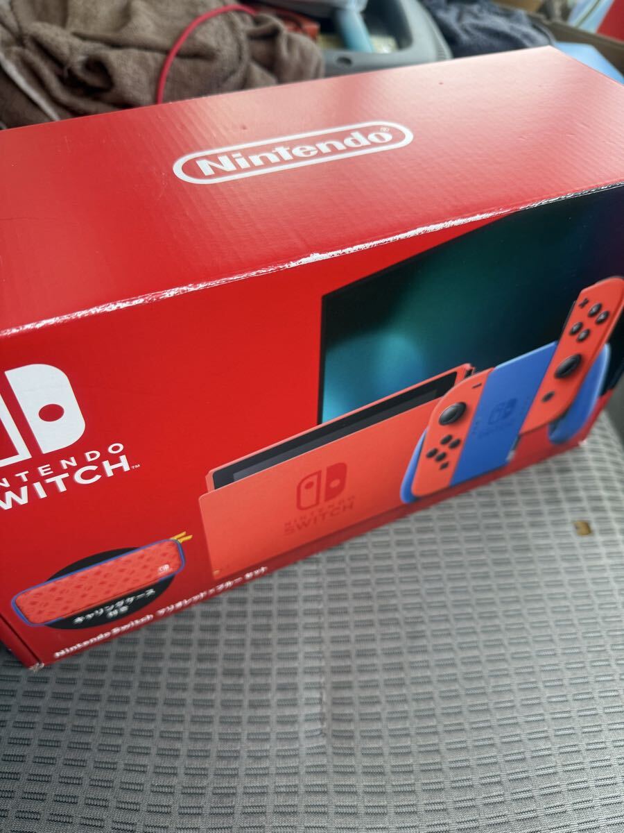 10. Nintendo 任天堂　Switch 本体　マリオレッド×ブルー　HAC-001 初期化未完了・簡易動作確認済　やや箱ダメージあり