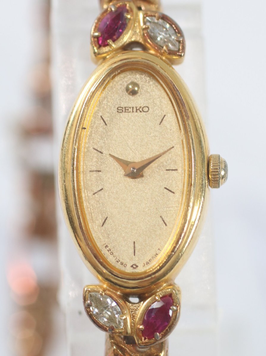 SEIKO セイコー 1E20-5760 オーバル 石付き ブレスウォッチ ゴールドカラー ゴールド文字盤 クオーツ レディース 腕時計 6966-BY