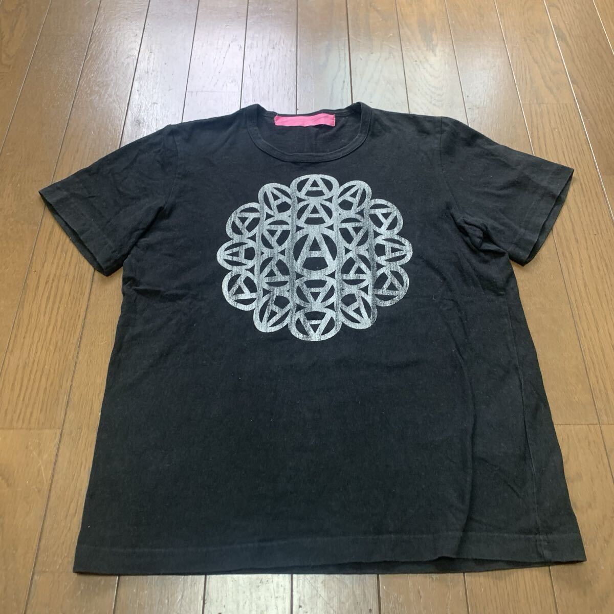 ジュンヤワタナベ コムデギャルソン アナーキーマーク サークルロゴ プリントTシャツ ブラック 半袖 junya Watanabe comme des garcons 