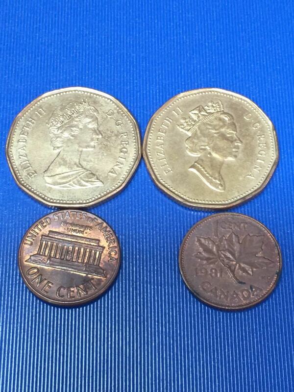 カナダ旧硬貨1ドル二種類二枚、1セント一枚、リンカーンセント1969年一枚、合計４枚希少セット