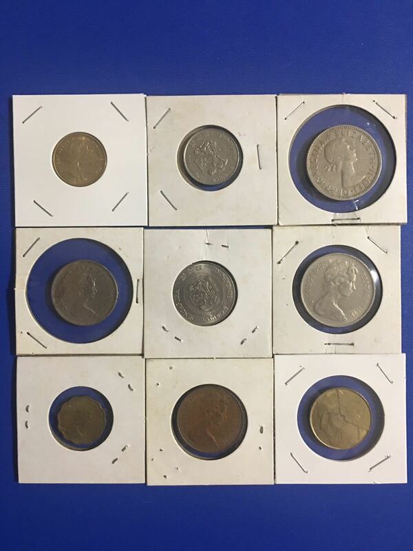 中国、香港、シンガポール、イギリス、ベルギーなどの旧硬貨九枚セット