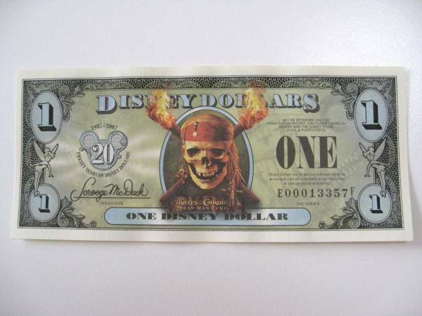 ディズニーダラー　1ドル札 （2007年版） $1 紙幣　ドクロ & 松明 Disney Dollars