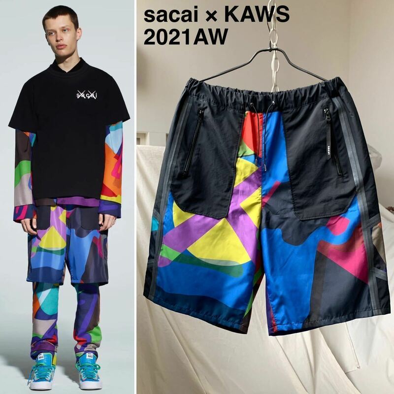 新品レア sacai サカイ KAWS カウズ Track Shorts Multi トラック ショーツ 定5.39万 メンズ ショート ハーフ パンツ マルチカラー 希少