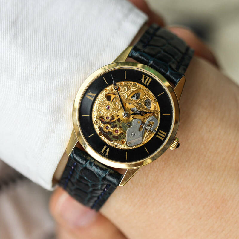 ユニバーサル ジュネーブ スケルトン ブラックダイヤル 手巻き ヴィンテージ アンティーク メンズ 腕時計