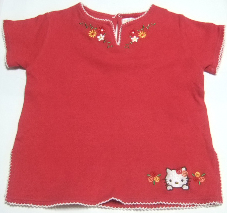 Hello Kittyのシャツ(赤,白縁取り,草花柄,90)。