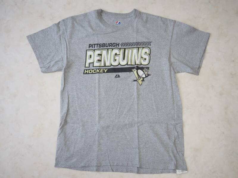 ☆送料無料☆ Majestic USA直輸入 古着 半袖 NHL PITTSBURGH PENGUINS ピッツバーグ・ペンギンズ Tシャツ メンズ L グレー トップス 中古