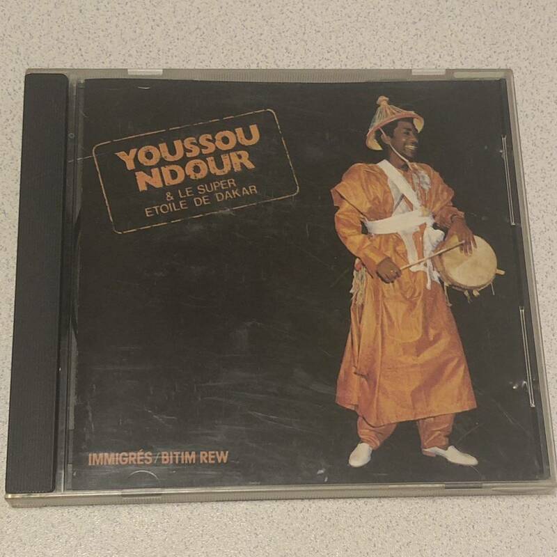 CD ユッス・ンドゥールImmigres Immigrsセネガルの歌手 パーカッショニストのユッスー・ンドゥールのアルバム 中古品