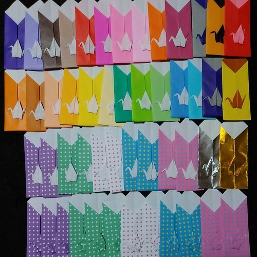 お得です！ 折り紙　お箸袋(鶴)　50袋+おまけ何袋かお付けします。　１枚の折り紙で出来ています。お箸入れ　ハンドメイド　ツル　つる
