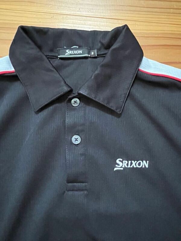送料込み！SRIXON 半袖ポロシャツ 黒 Mサイズ スリクソン 肩ライン GOLF ゴルフウェア ブラック 半袖シャツ