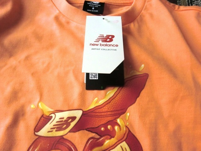 新品　 New Balance(ニューバランス)Athletics Kody Mason グラフィックTシャツ　M 　価格5.390円税込 MT21559　オレンジ
