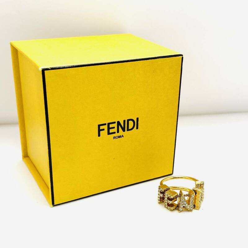 FENDI フェンディ ラインストーン リング 指輪 表記サイズS 約9号 ロゴ ゴールドカラー レディース アクセサリー 箱付き