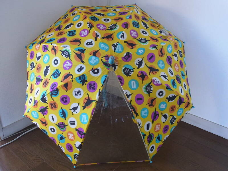 小学校低学年用　透明窓つき　怪獣のプリント　傘（イエロー×水色）