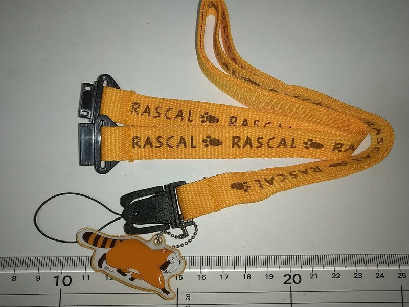 【未使用】あらいぐまラスカルネックストラップ RASUCAL足跡マークオレンジ首回り86cm携帯クリーナーボールチェーン根付け